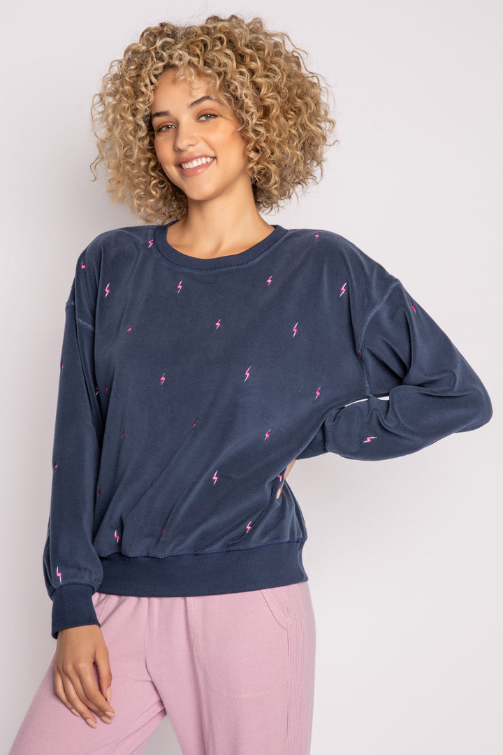 Dark blue pullover top with mini lightning bolt embroideries on exposed boucle' fleece knit. (7231883837540)