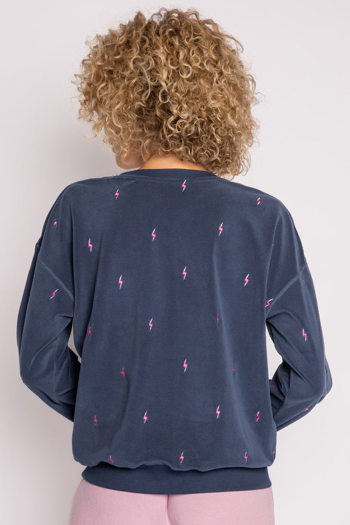 Dark blue pullover top with mini lightning bolt embroideries on exposed boucle' fleece knit. (7231883837540)