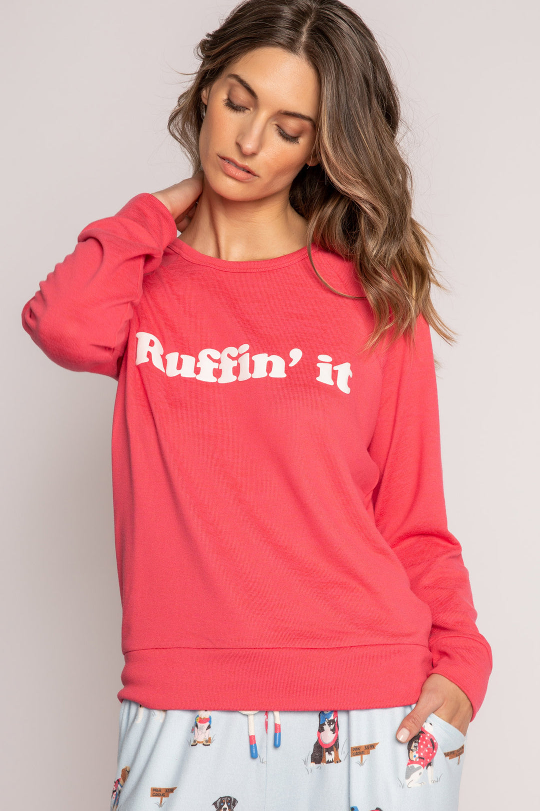 Red long sleeve top in brushed knit with white printed puff lettering on front. (7215772991588)