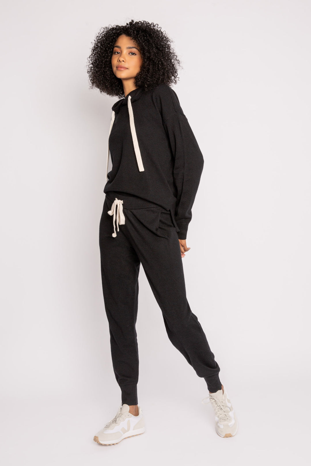 Black sweater knit lounge set hoody & high-waisted pant with contrast ivory drawcords. (7231885475940)
