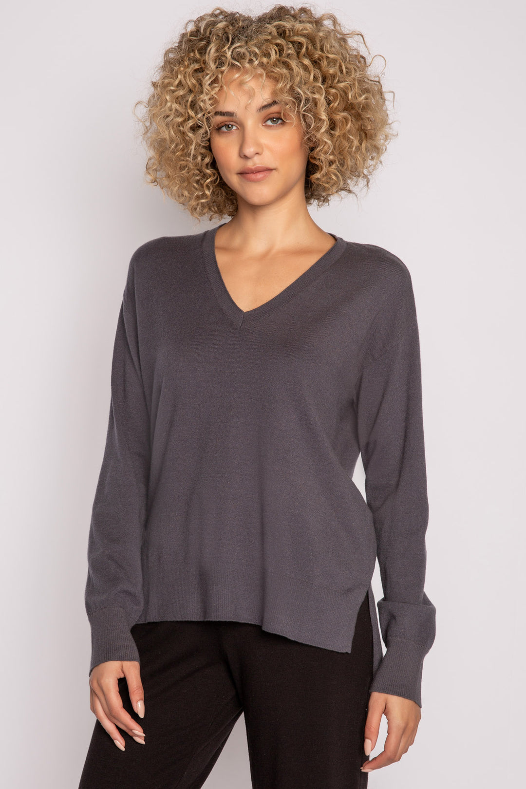 Sweater-knit V-neck sweater in charcoal with open high-low hem. (7231885803620)