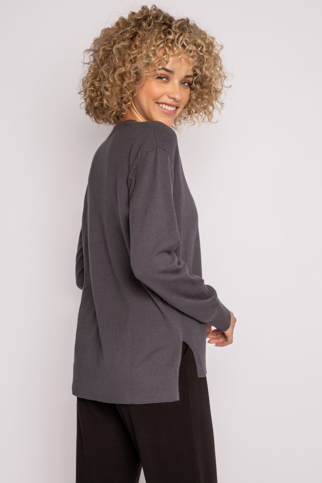 Sweater-knit V-neck sweater in charcoal with open high-low hem. (7231885803620)