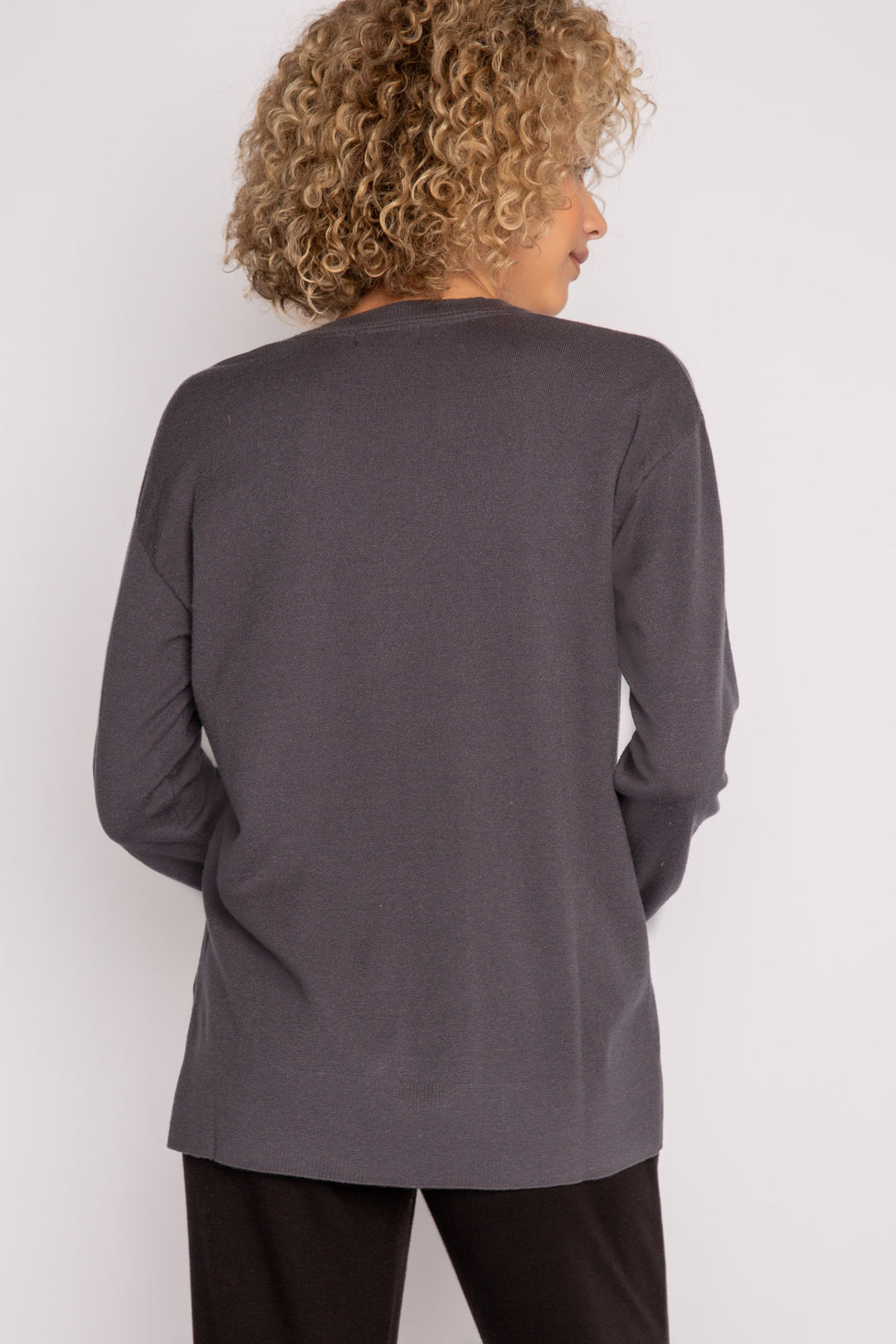 Sweater-knit V-neck sweater in charcoal with open high-low hem. (7231885803620)