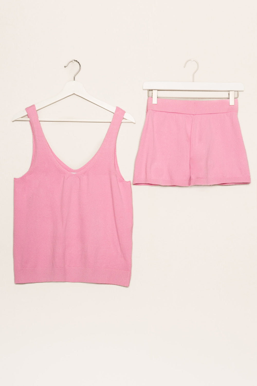 Matching pink short set in light sweater knit with wide ribbed waist. Top has double V-neck. (7196191555684)