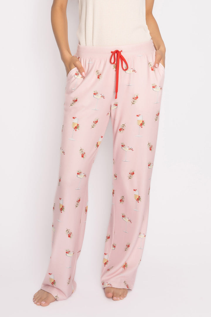 Light pink pj pant with mistletoe & cocktail print. Contrast red stitching & red tie waist. Side pockets. (7257677103204)