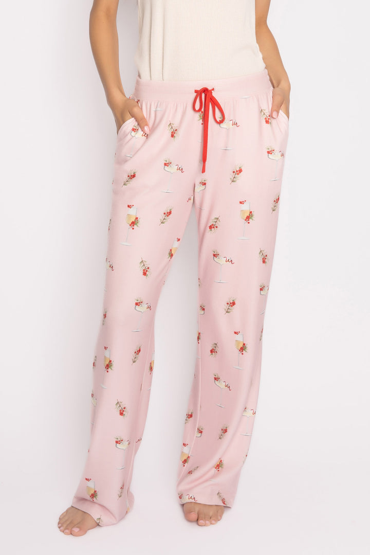 Light pink pj pant with mistletoe & cocktail print. Contrast red stitching & red tie waist. Side pockets. (7257677103204)