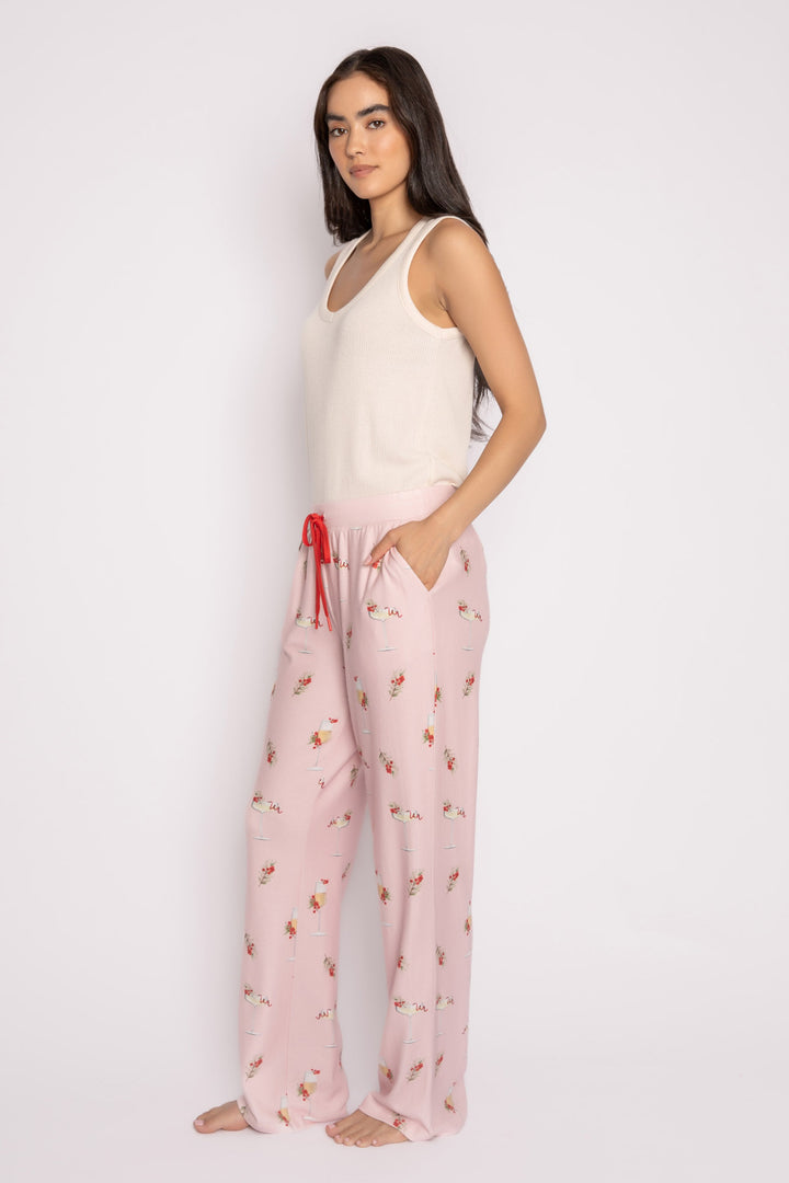 Light pink pj pant with mistletoe & cocktail print. Contrast red stitching & red tie waist. Side pockets. (7257677103204)