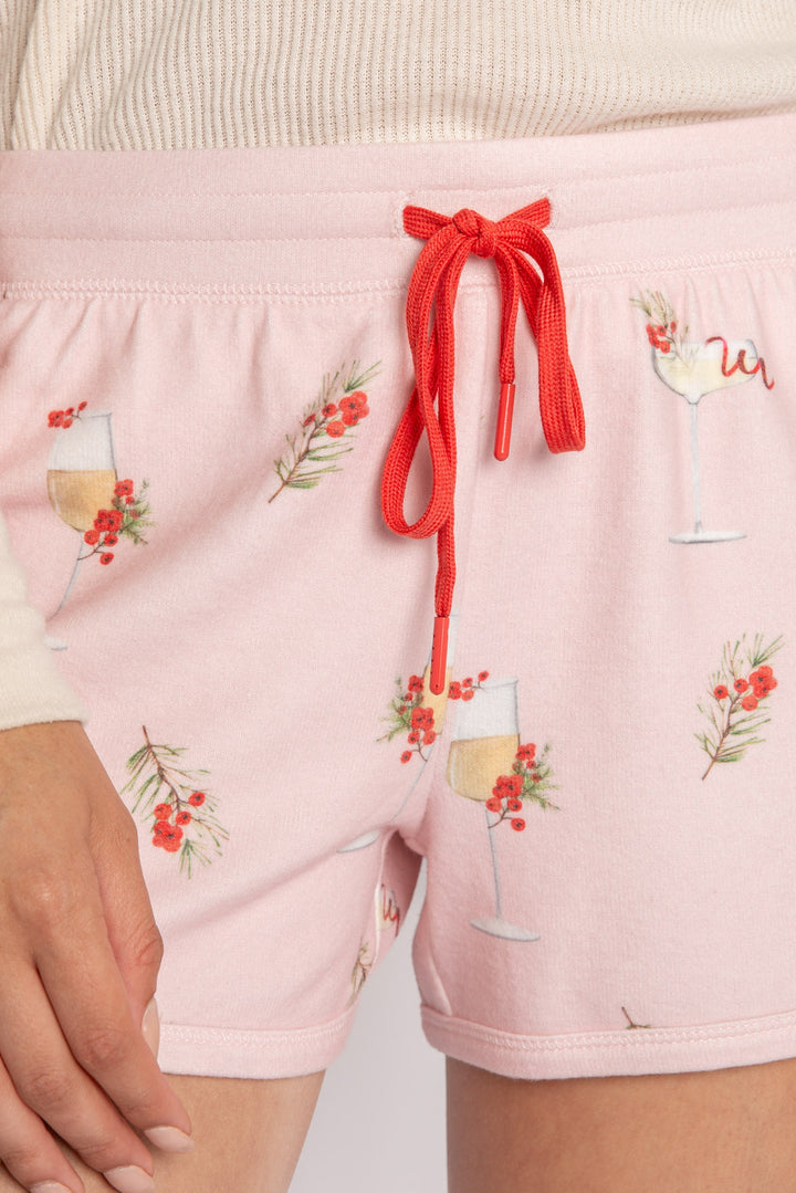 Light pink pajama short with mistletoe & cocktail print. Contrast red stitching & red tie waist. (7257677135972)