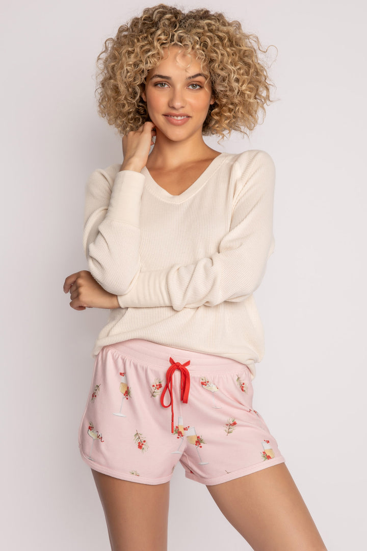 Light pink pajama short with mistletoe & cocktail print. Contrast red stitching & red tie waist. (7257677135972)