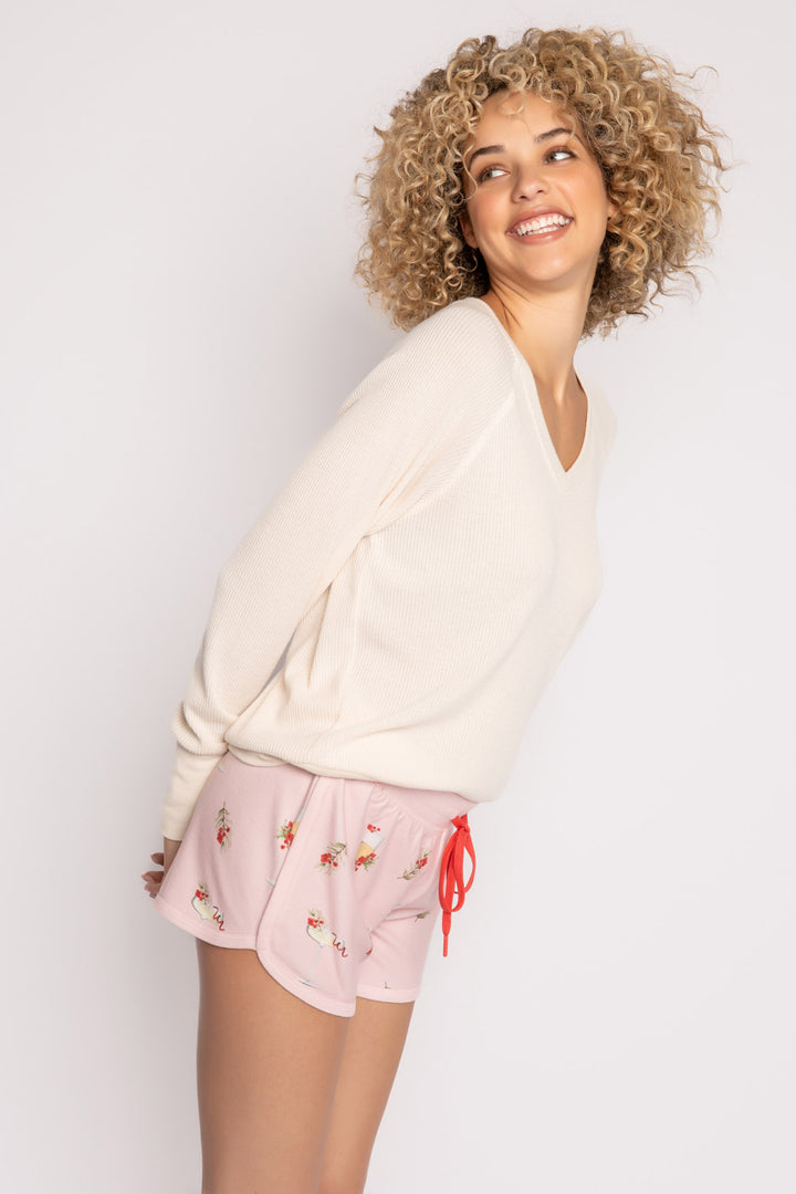 Light pink pajama short with mistletoe & cocktail print. Contrast red stitching & red tie waist. (7257677135972)