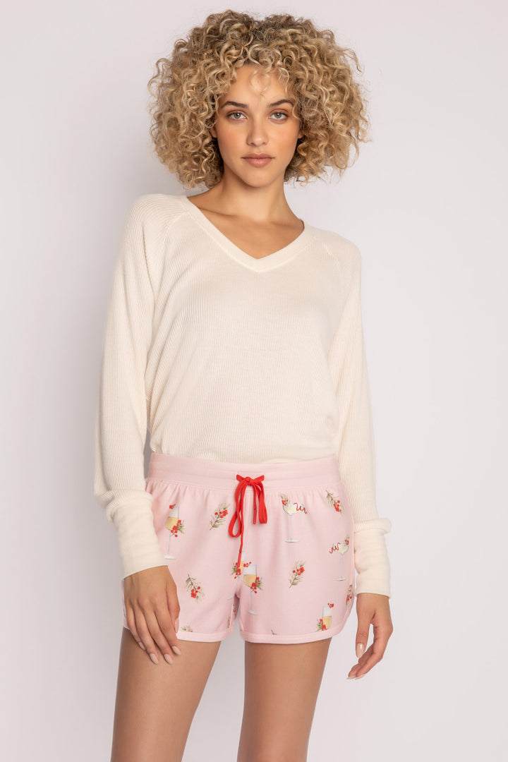 Light pink pajama short with mistletoe & cocktail print. Contrast red stitching & red tie waist. (7257677135972)