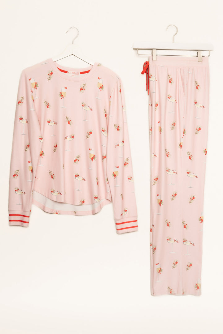 Light pink pj set with mistletoe & cocktail print. Top & straight-leg pant with pockets. Contrast red tie waist. (7257677201508)