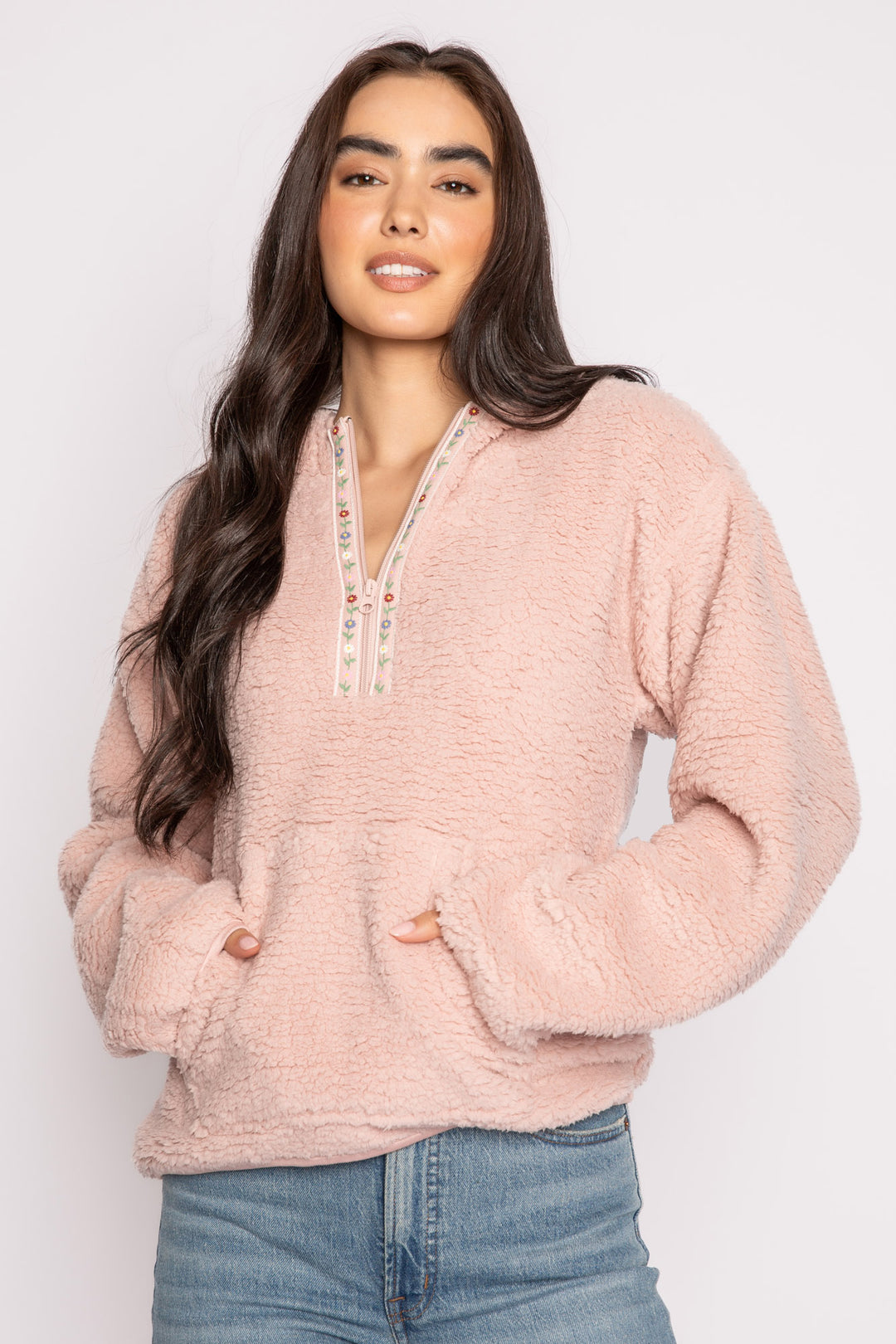 Pink half-zip pullover in faux shearling fur with embroidered taping. Front pocket & banded cuffs. (7257677267044)