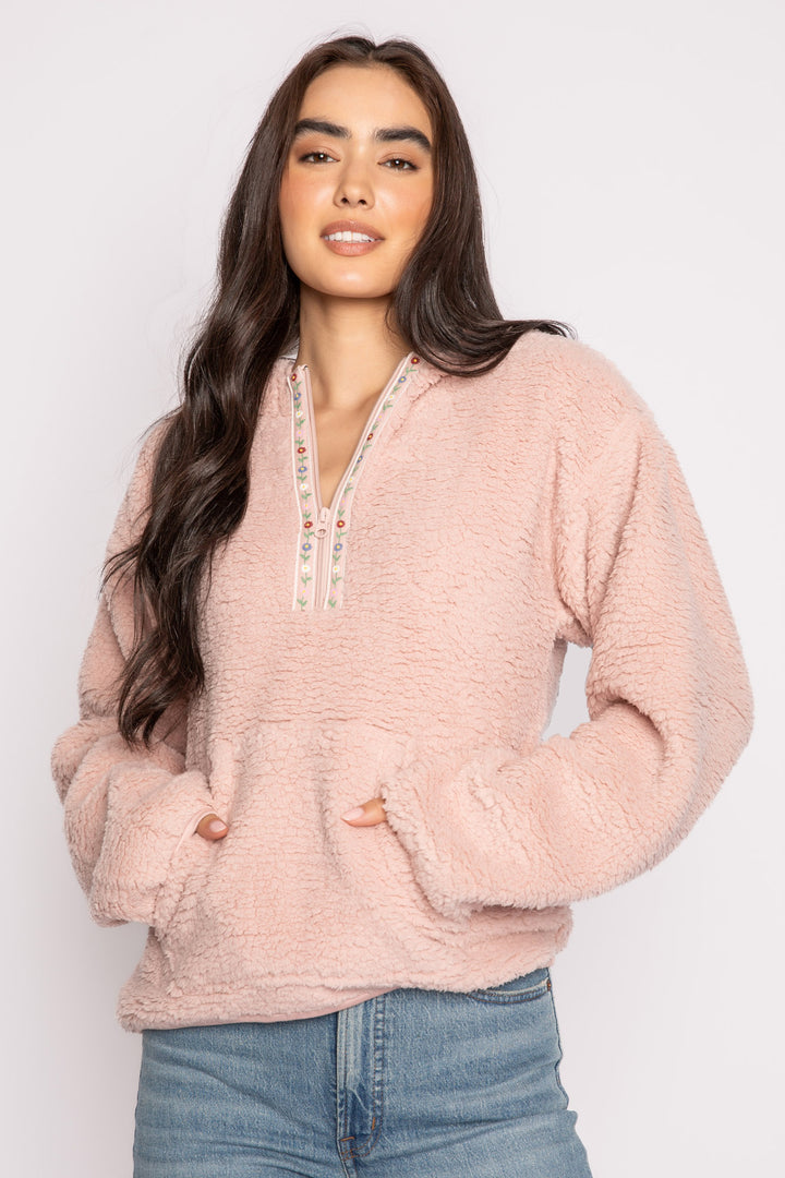 Pink half-zip pullover in faux shearling fur with embroidered taping. Front pocket & banded cuffs. (7257677267044)
