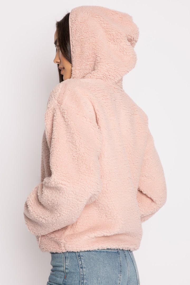 Pink half-zip pullover in faux shearling fur with embroidered taping. Front pocket & banded cuffs. (7257677267044)