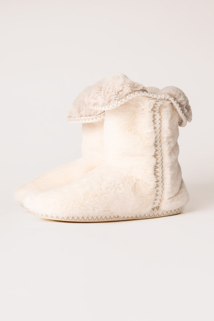 Ivory faux fur slouchy bootie with side taping. Molded sole for indoor-outdoor wear. (7257677463652)