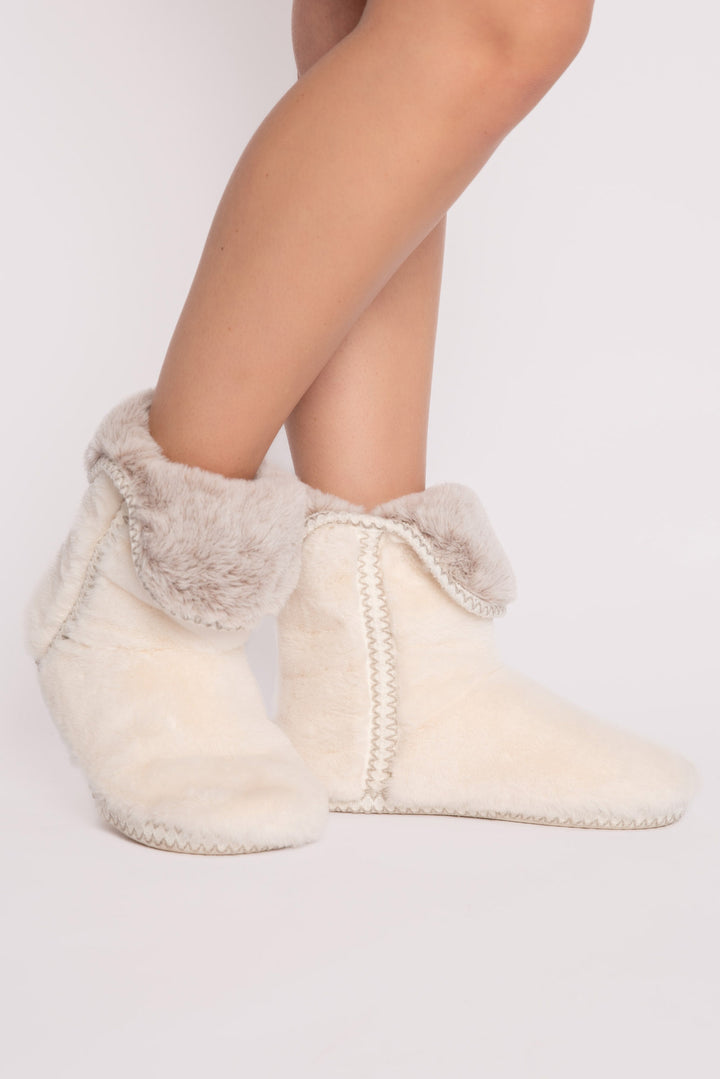 Ivory faux fur slouchy bootie with side taping. Molded sole for indoor-outdoor wear. (7257677463652)
