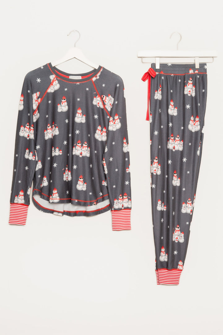 Festive pj set in grey thermal velour top & jammie pant with snowman print. Red & white striped cuffs. (7257677922404)