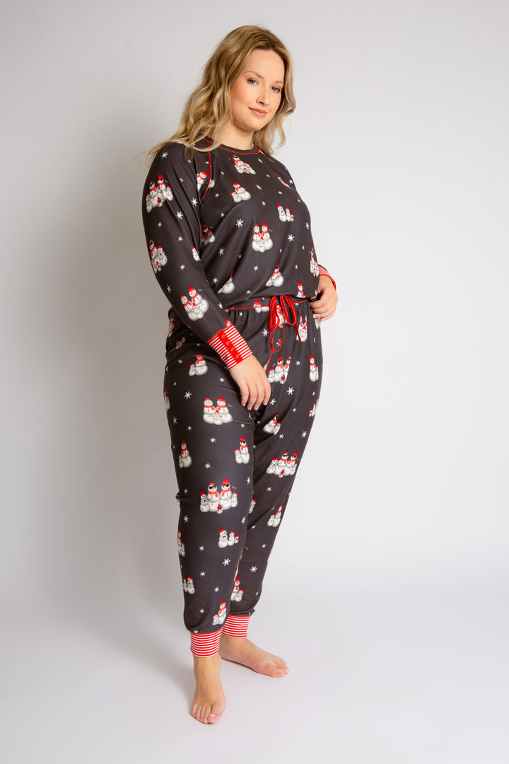 Festive pj set in grey thermal velour top & jammie pant with snowman print. Red & white striped cuffs. (7257677922404)