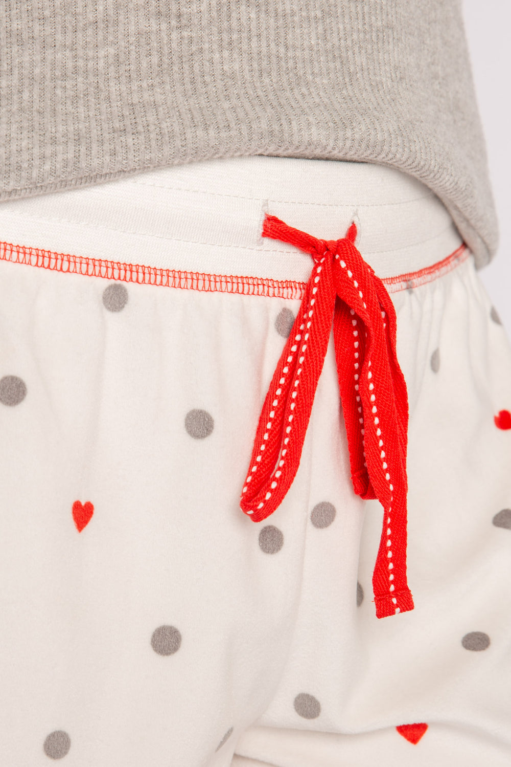 Silky velour knit pajama short in ivory-grey-red dot pattern. Contrast red stitching & red tie-waist (7257678315620)