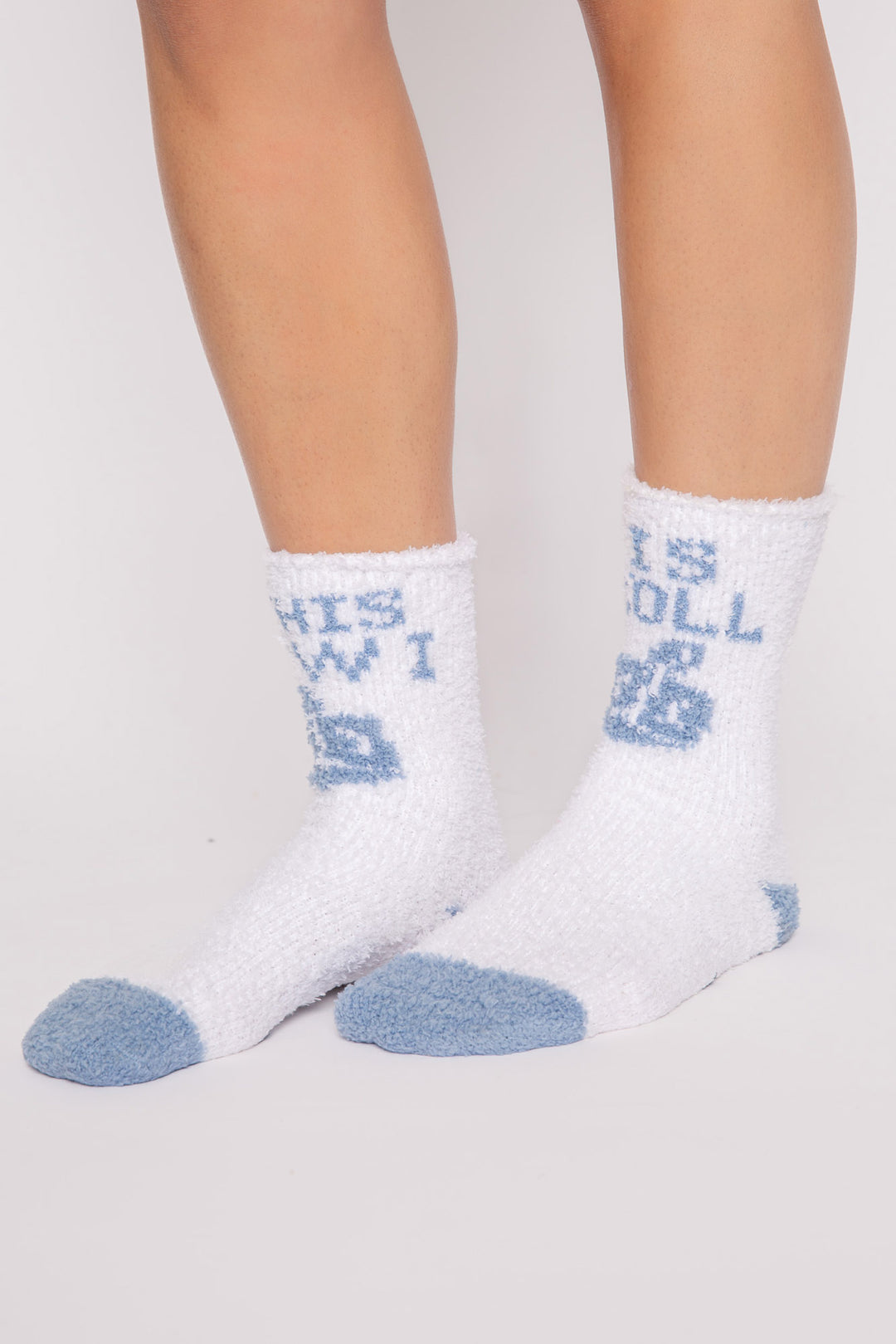 Ivory plush socks with blue 'This is how I roll' dreidel Hanukkah print. Gripper print on soles. (7257678905444)