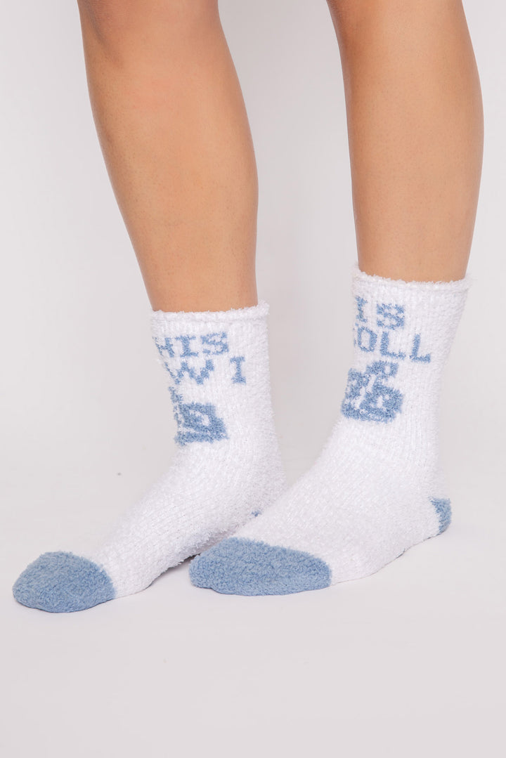 Ivory plush socks with blue 'This is how I roll' dreidel Hanukkah print. Gripper print on soles. (7257678905444)