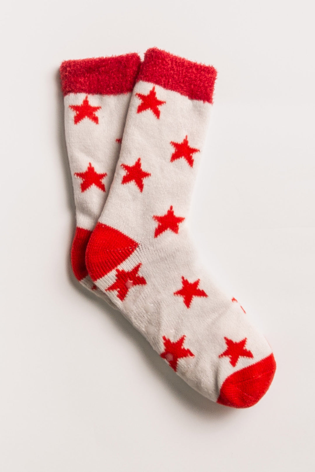 Ivory plush socks with red stars pattern & fleecy lining. Gripper print on soles for non-skid. (7257679167588)
