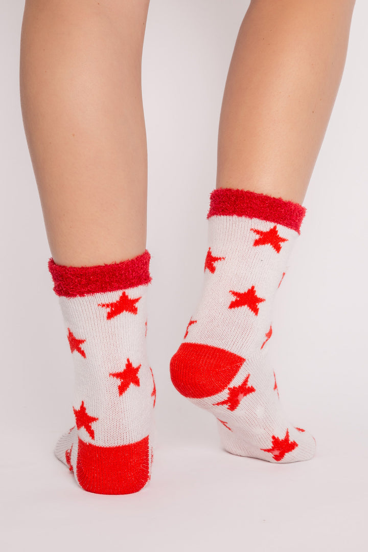 Ivory plush socks with red stars pattern & fleecy lining. Gripper print on soles for non-skid. (7257679167588)