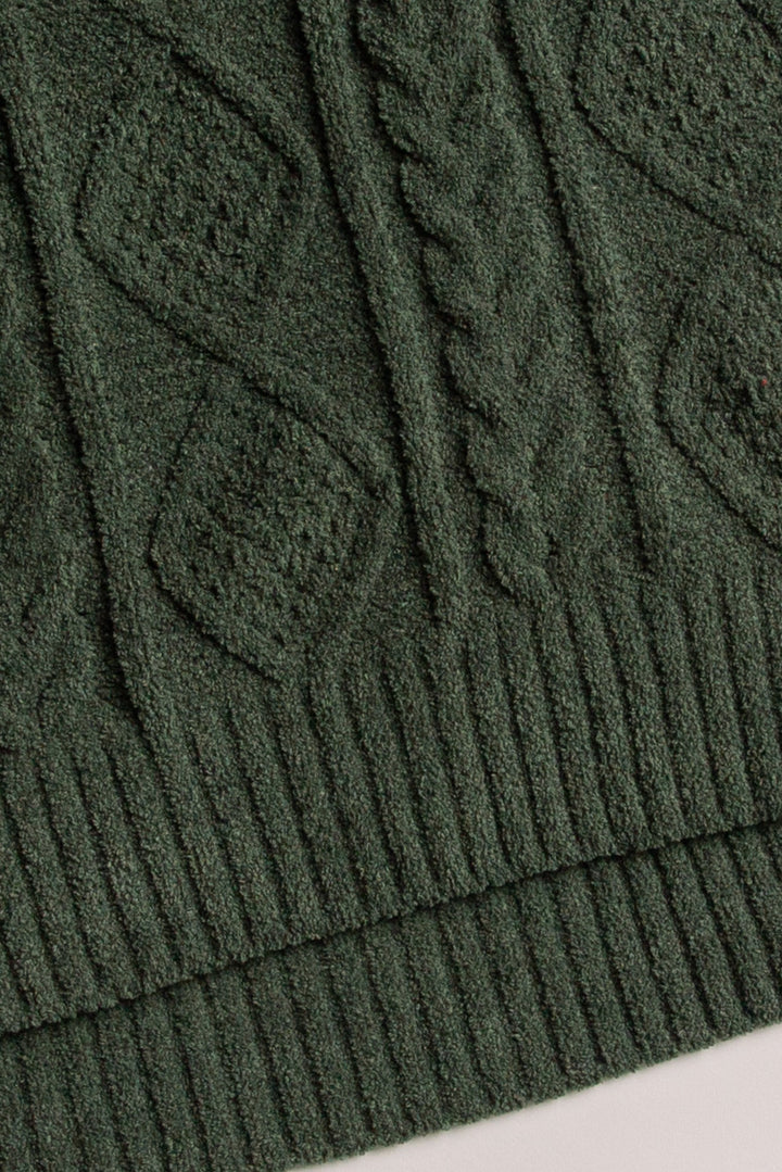Cardigan sweater in green chenille knit cable pattern. Two lower front pockets & 3-button closure. (7257679298660)