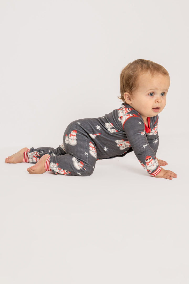 Infant pajama in grey thermal velour with festive snowman print. Red & white striped cuffs. (7257679626340)