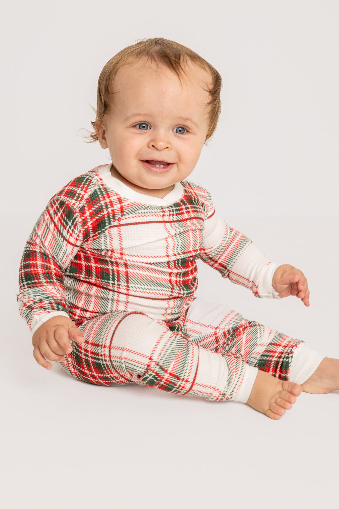 Baby pj romper in gender-neutral ivory-red-green plaid on velour thermal. Covered snaps. (7257679691876)