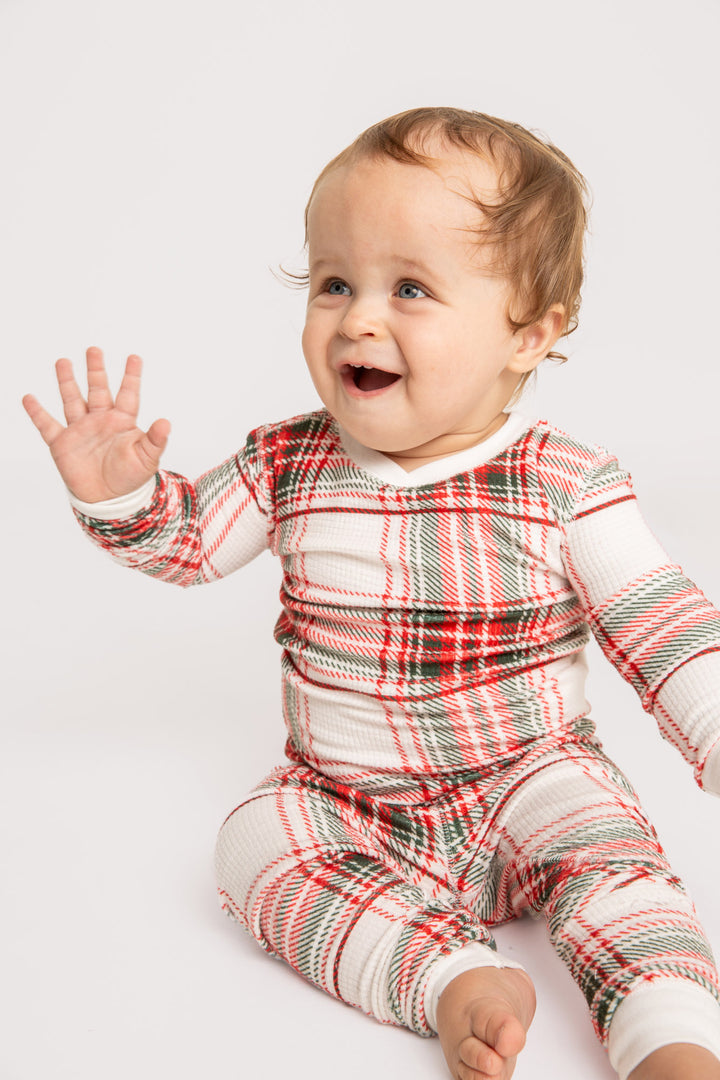 Baby pj romper in gender-neutral ivory-red-green plaid on velour thermal. Covered snaps. (7257679691876)
