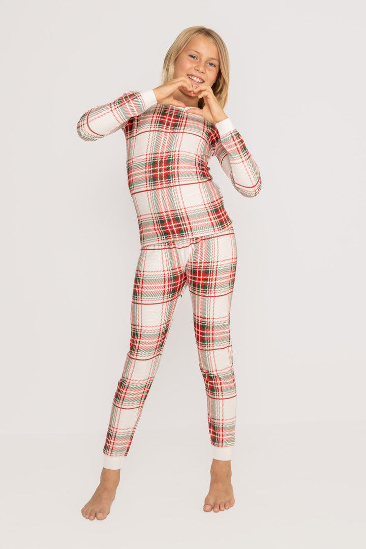 Kids' pajama set in gender-neutral ivory-red-green plaid on velour thermal. Top & pj pant. (7257679724644)