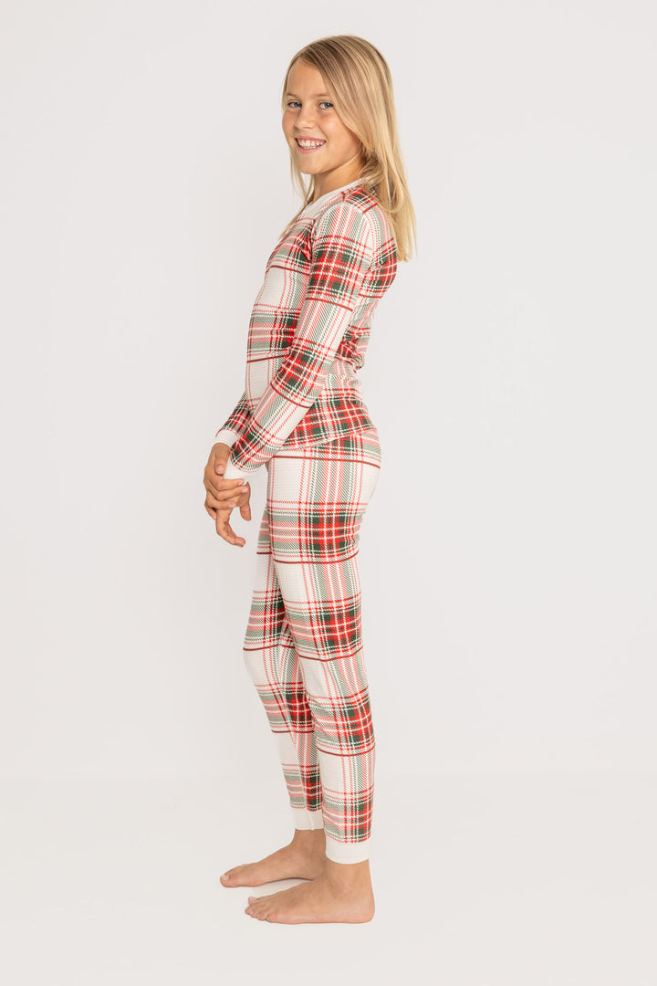 Kids' pajama set in gender-neutral ivory-red-green plaid on velour thermal. Top & pj pant. (7257679724644)