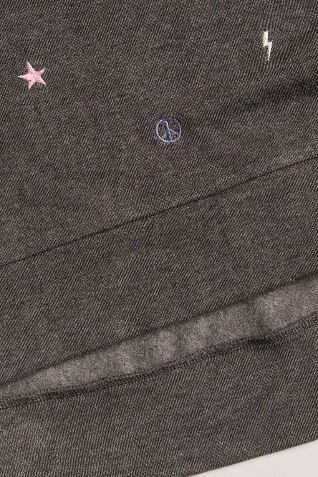 Lounge set top & jogger in dark grey fleece. Mini peace-heart-star all-over embroidered pattern. (7257679888484)