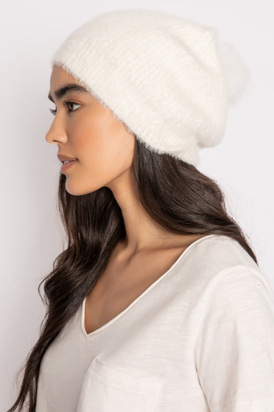 Soft ivory feather knit beanie hat. Ivory pom pom puff on top. Ribbed hat trim. (7257680052324)