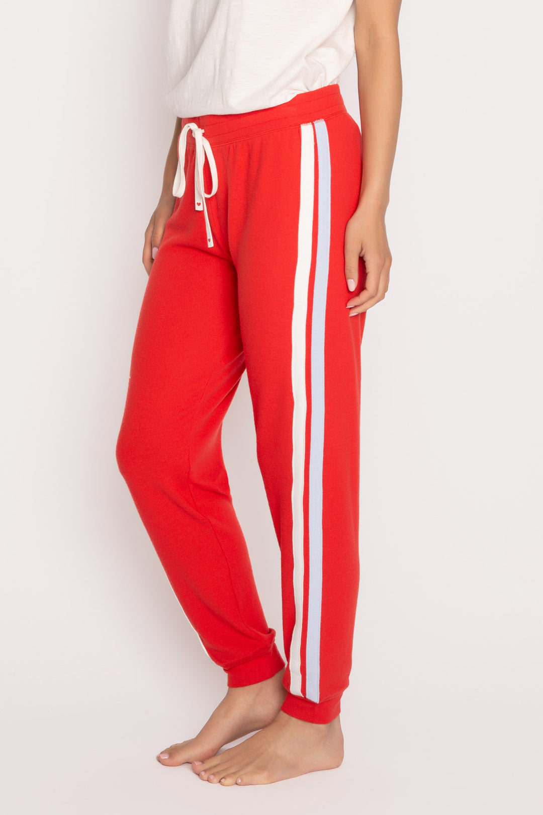 Red soft knit jogger pant with blue & white stripes on side seams. Tie waist with mini heart on ties. (7257680248932)