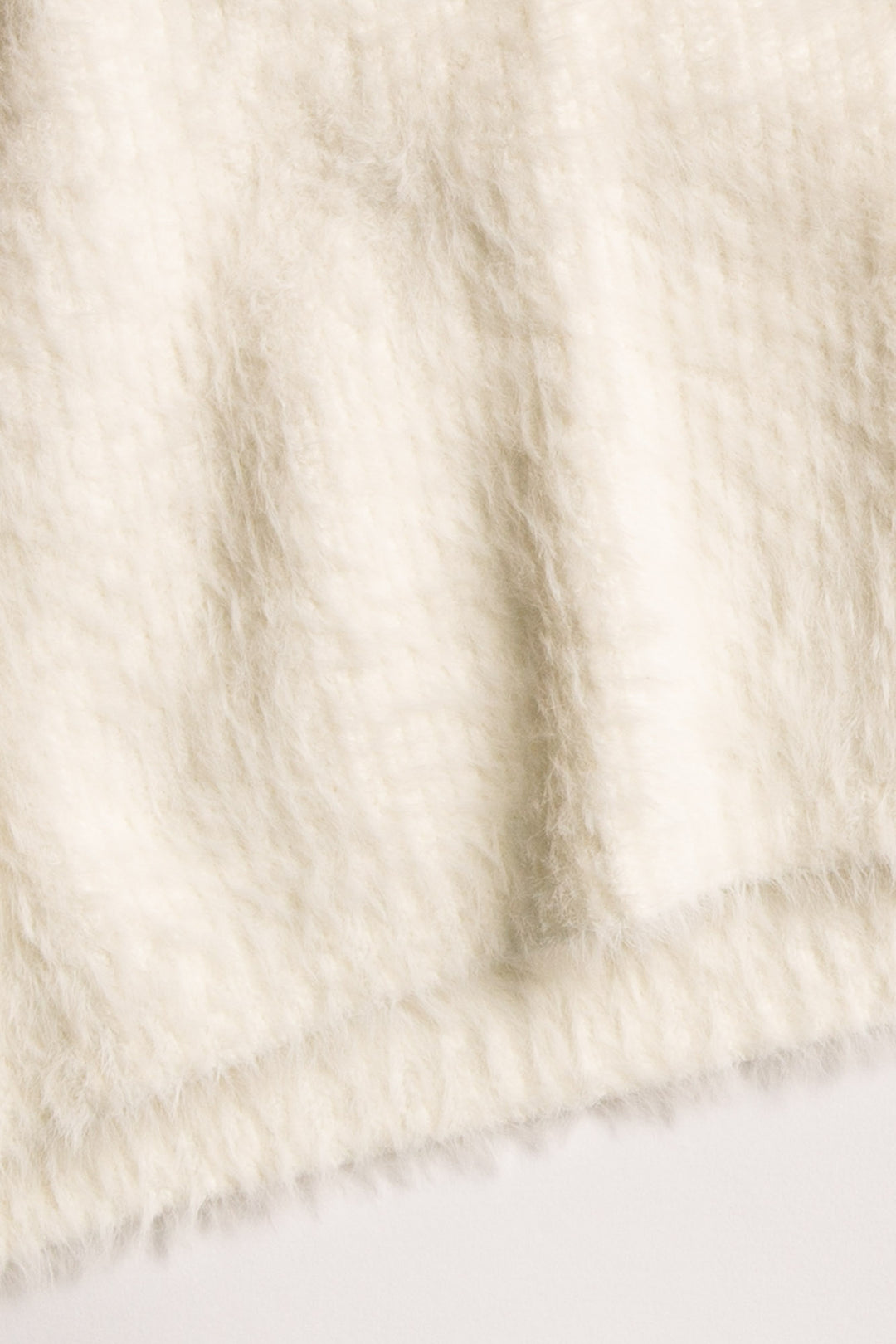 Soft ivory feather knit short with rib waistband. Relaxed, pull-on fit, no ties or pockets. (7257680347236)