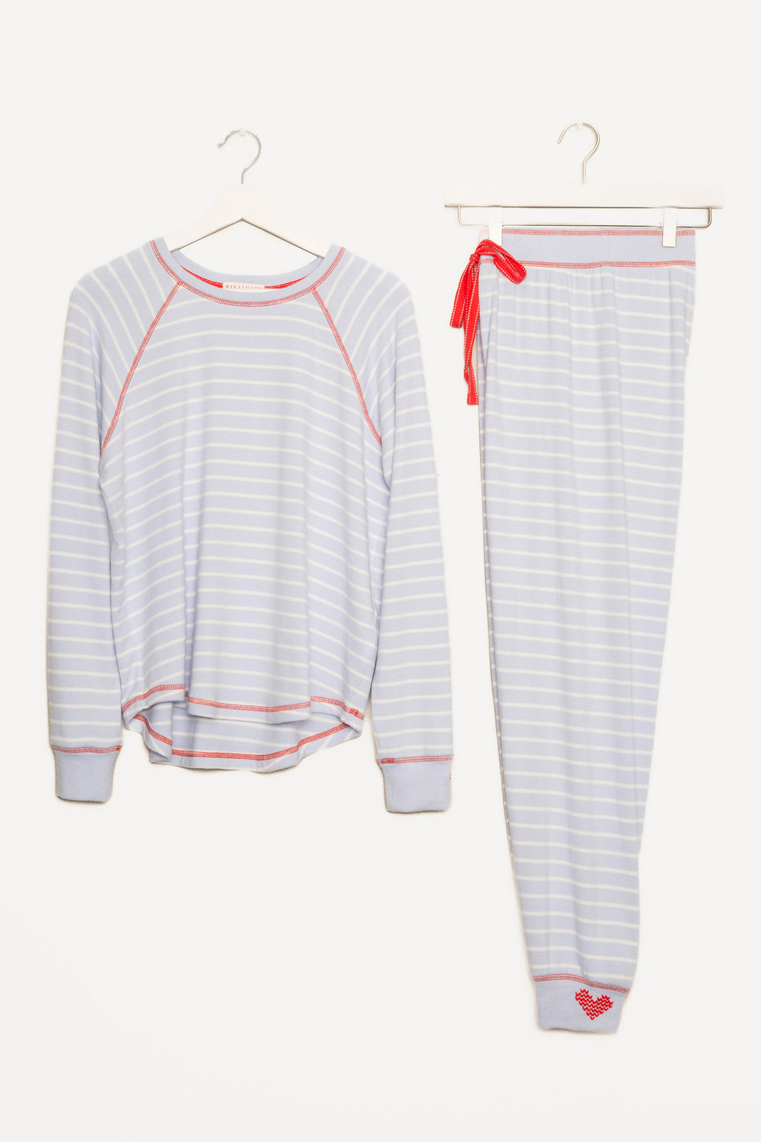 PJ set in blue-white striped knit, red stitching & heart embroidery at sleeve & pant cuffs. Red ties. (7257680314468)