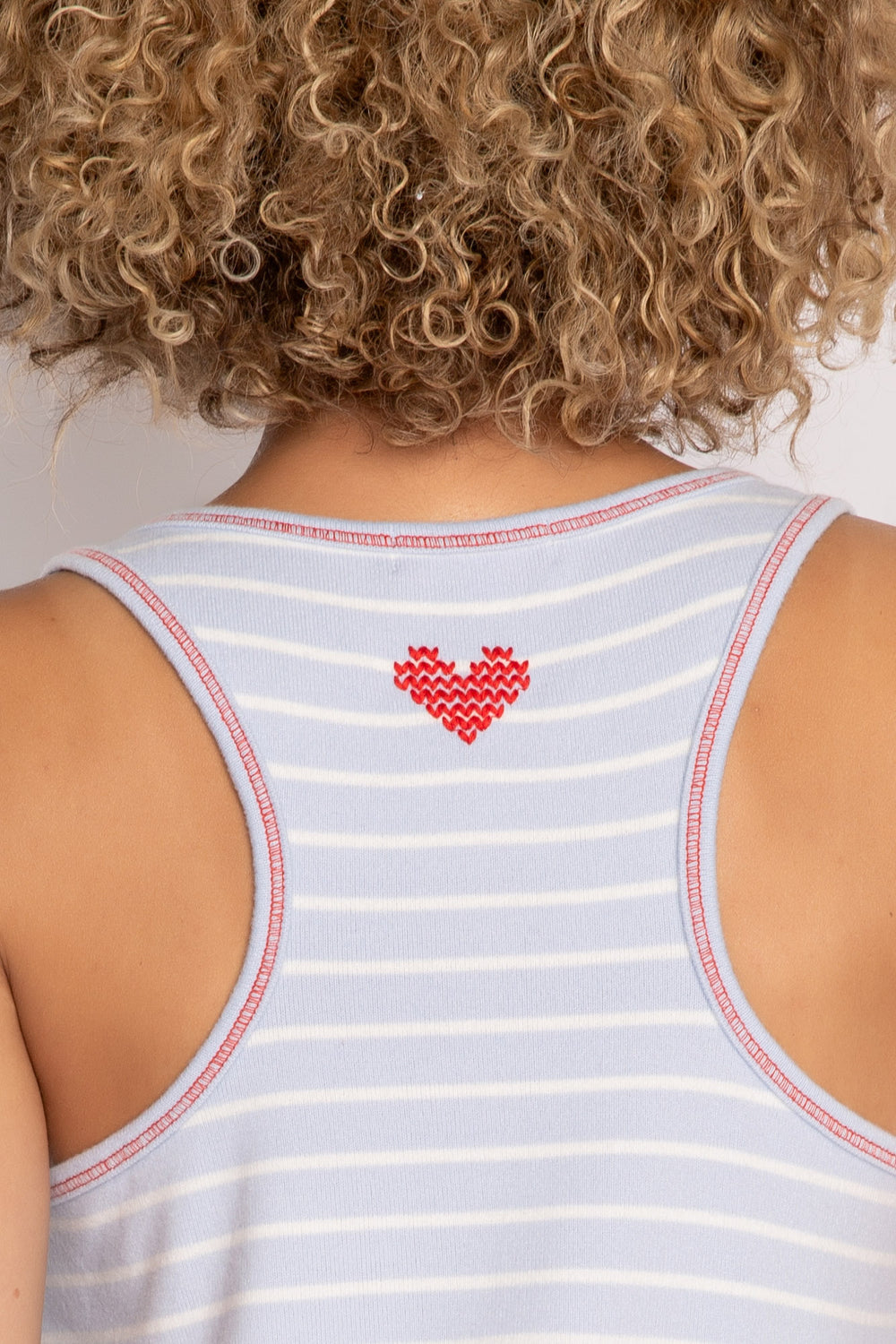 Sleep tank top in blue-white mini striped knit, with red stitching & heart embroidery on back neck. (7257680412772)