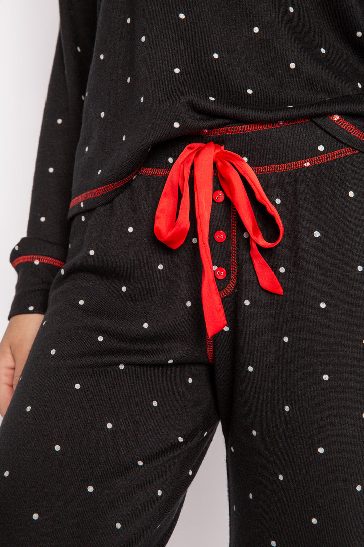 Black pajama set in matching gift bag. Dot-print top & pj pant & red /ribbon tie, in Repreve soft knit. (7200024297572)