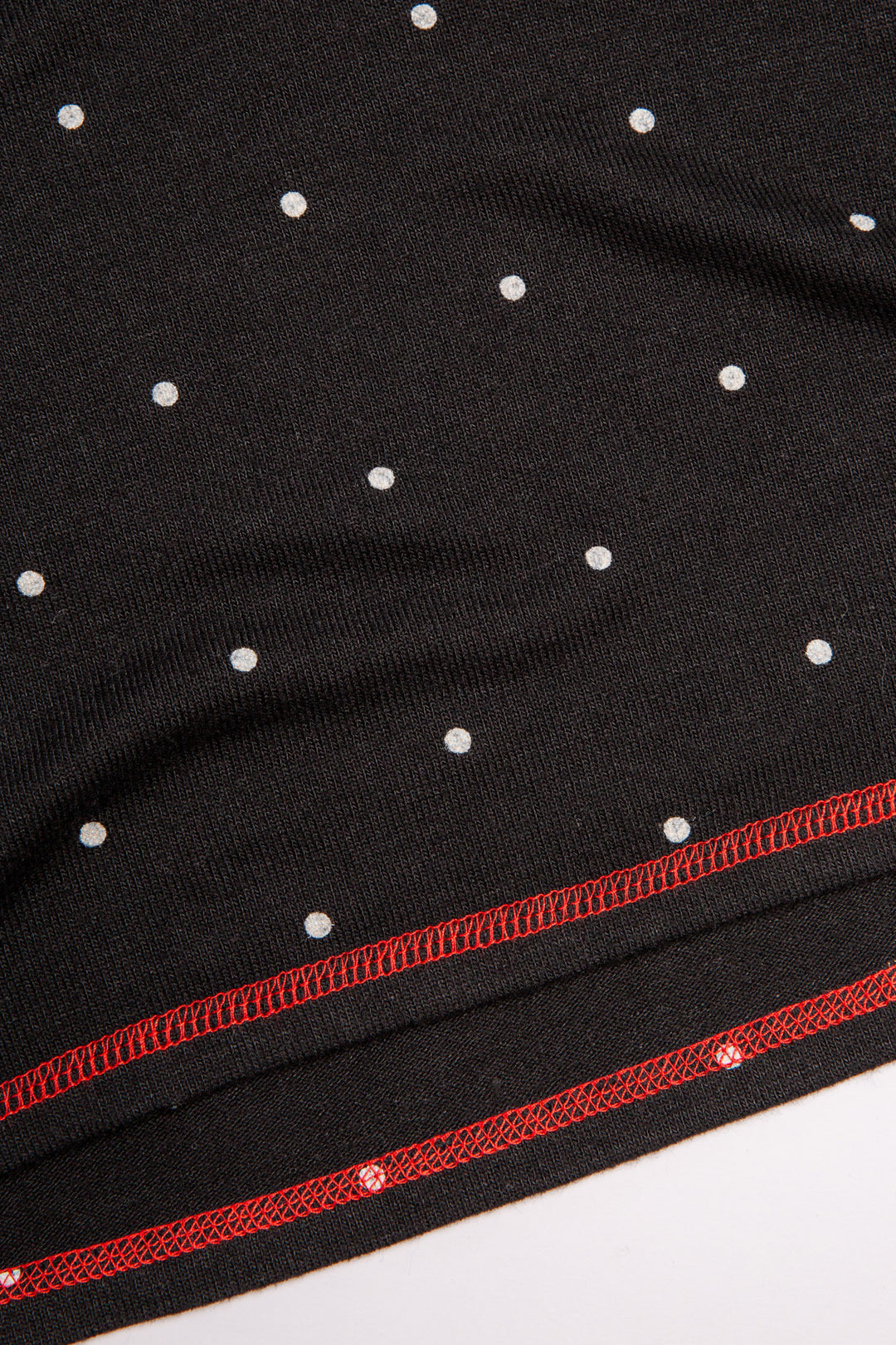 Black pajama set in matching gift bag. Dot-print top & pj pant & red /ribbon tie, in Repreve soft knit. (7200024297572)