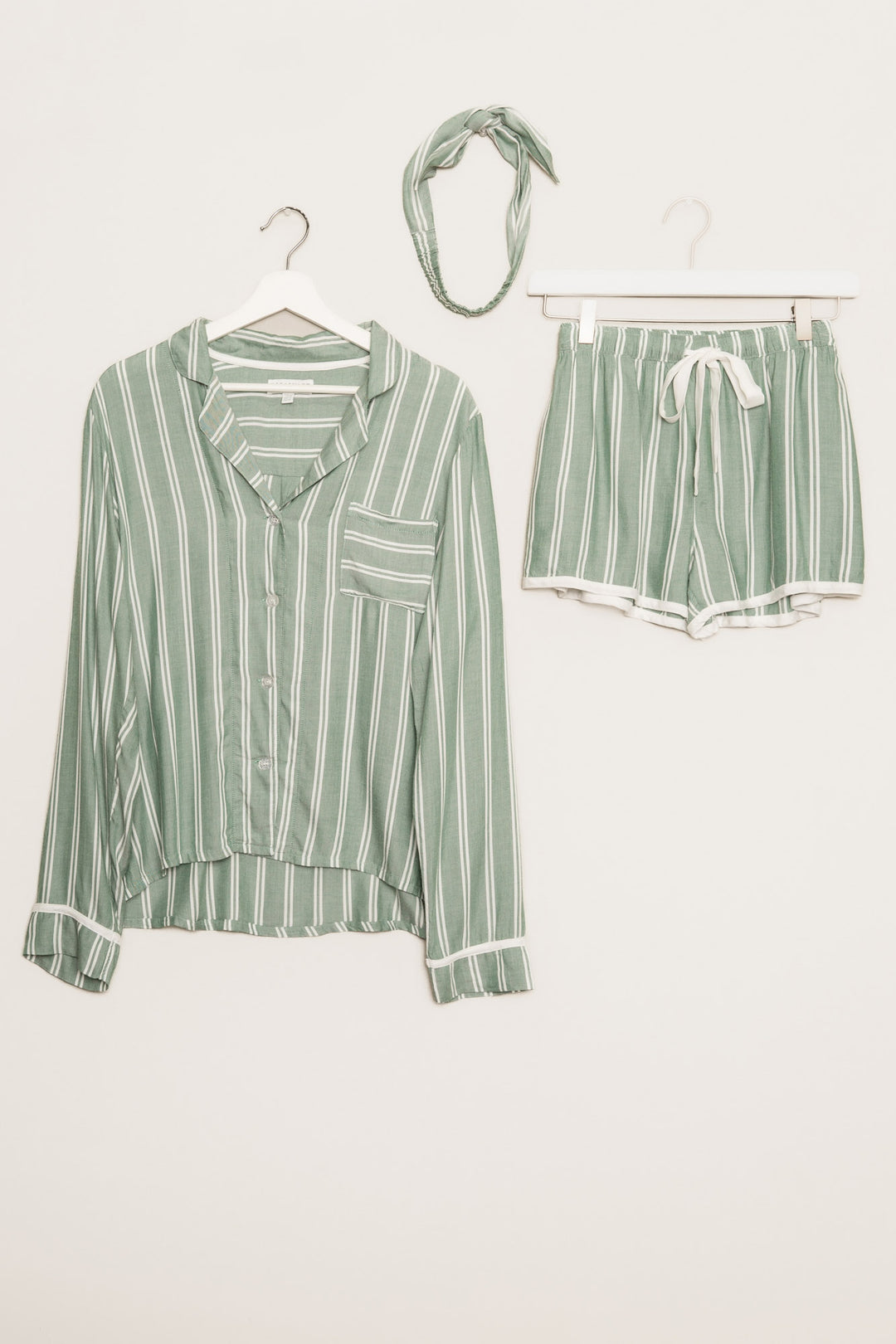 Ivory-green striped woven pajama short set. Long sleeve button top, short has tie waist. Hair wrap incl. (7257680609380)