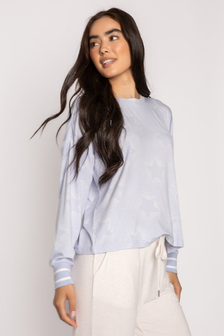 Luxe aloe-infused jersey pajama top in light blue with muted ivory star print. White striped cuffs. (7257680871524)
