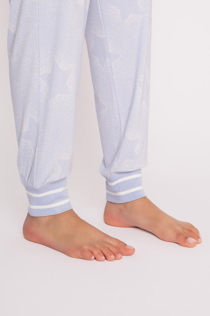 Luxe aloe-infused jersey pajama pant in light blue with muted ivory star print. White striped cuffs. (7257680904292)