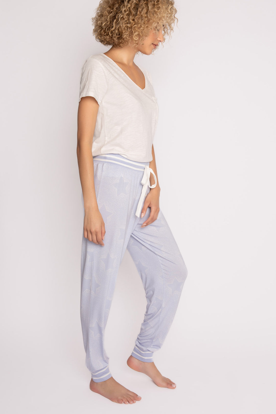 Luxe aloe-infused jersey pajama pant in light blue with muted ivory star print. White striped cuffs. (7257680904292)