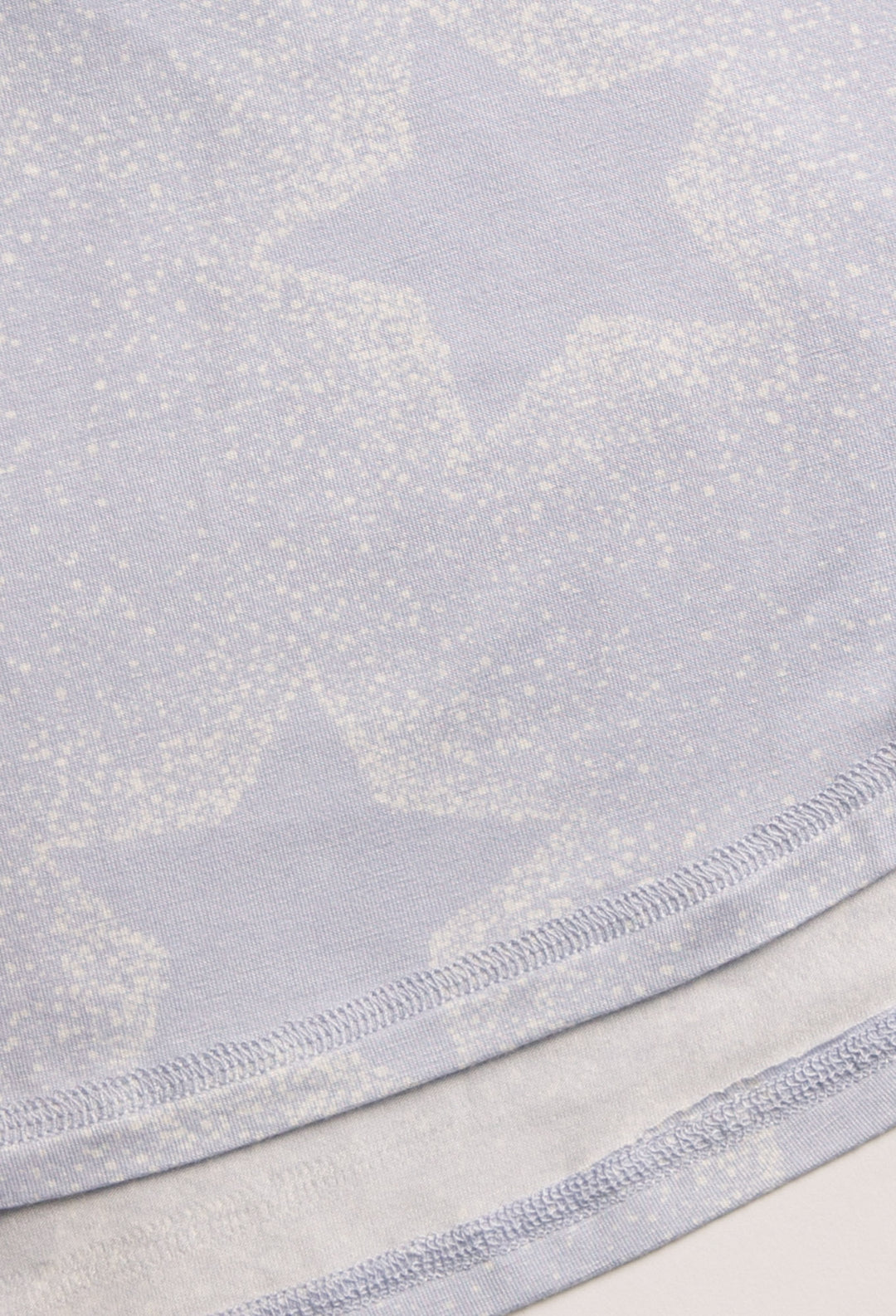Luxe aloe-infused jersey sleep tank top in light blue with muted ivory star print. Rounded hem. (7257681002596)