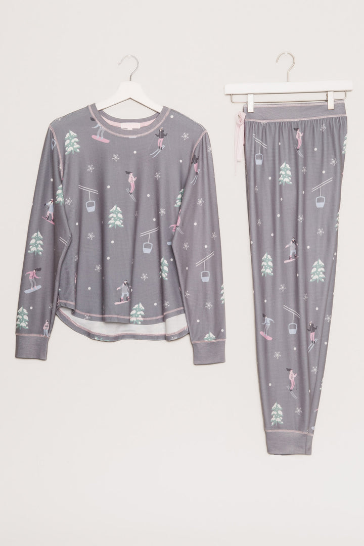 Grey velour thermal pj set with alpine tree & skier print. Pant has pink contrast tie-waist. (7257681166436)