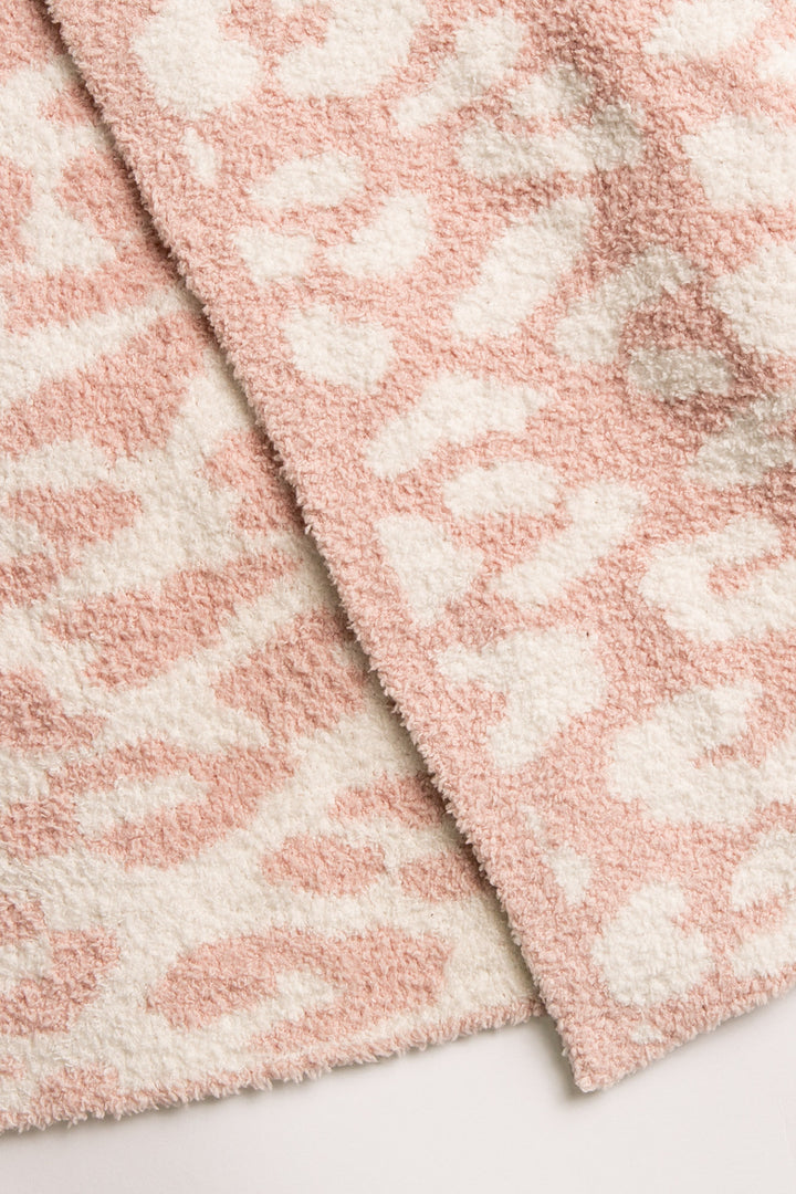 Reversible pink-ivory leopard-printed marshmallow blanket Personal size 50" x 65" with carry-strap. (7257681231972)