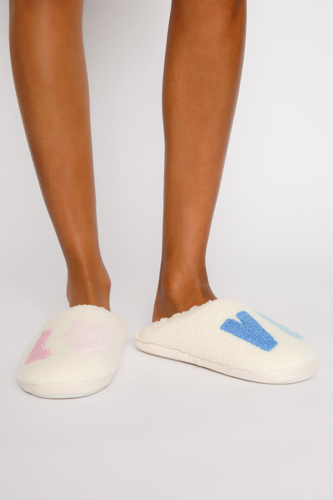 Fuzzy faux fur slipper with leopard printed insole wtih light pink furry upper. Molded soles. (7325665034340)